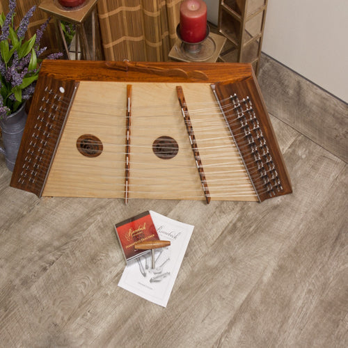 Roosebeck 12/11 Hammered Dulcimer, front view of the rosewood body with hammers