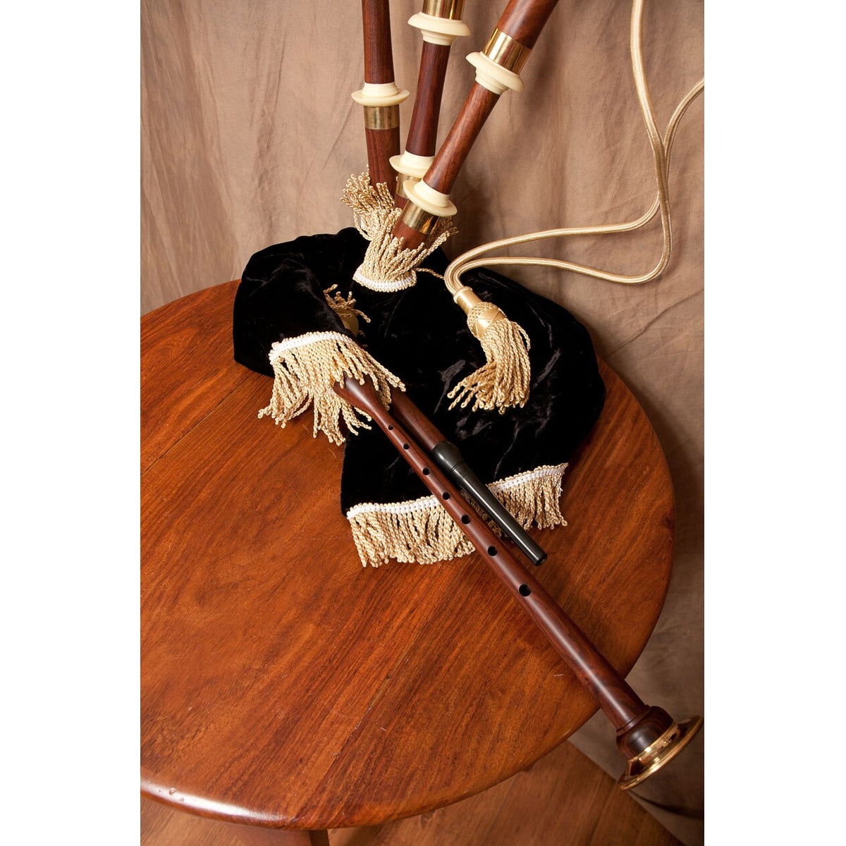 Brass and imitation ivory chalice mounts on the Roosebeck bagpipe