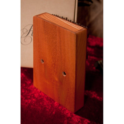 Back of the Roosebeck red cedar kalimba showing the vibrato holes