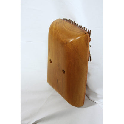 Rounded back of the Roosebeck red cedar kalimba