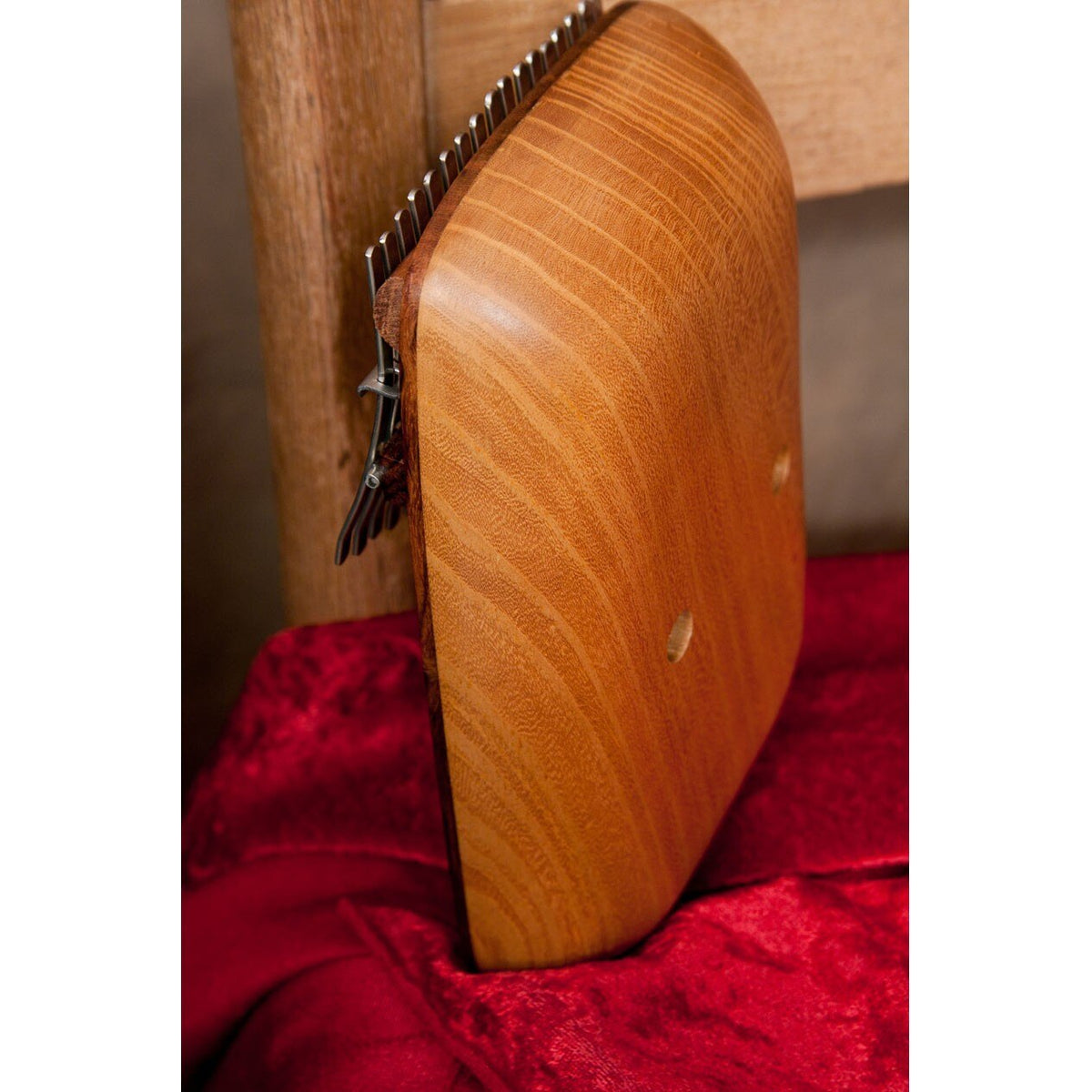 Rounded back of the Roosebeck Rosewood kalimba