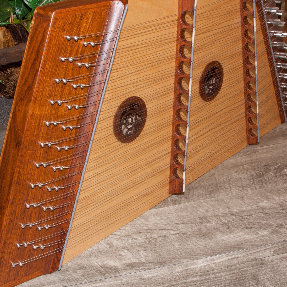 Roosebeck 12/11 Hammered Dulcimer, side view of the tuning pins and bridges
